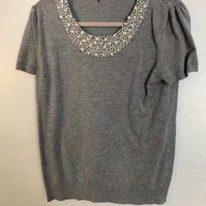 Grey sweater with pearls around collar